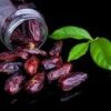 Delicious fresh dates with leaves on a black background, showcasing healthy eating.